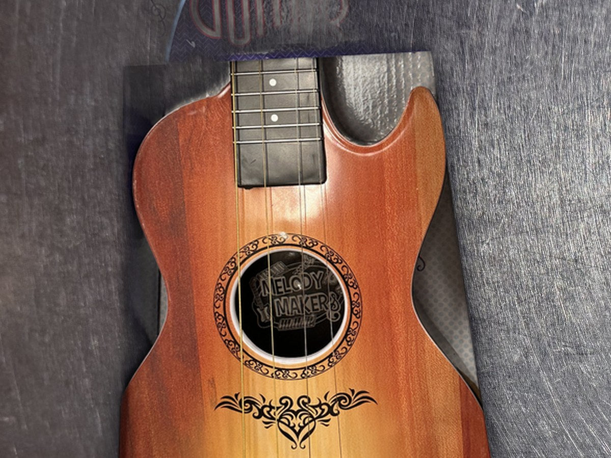 Melody Maker Acoustic Guitar Toy: no lead detected by XRF